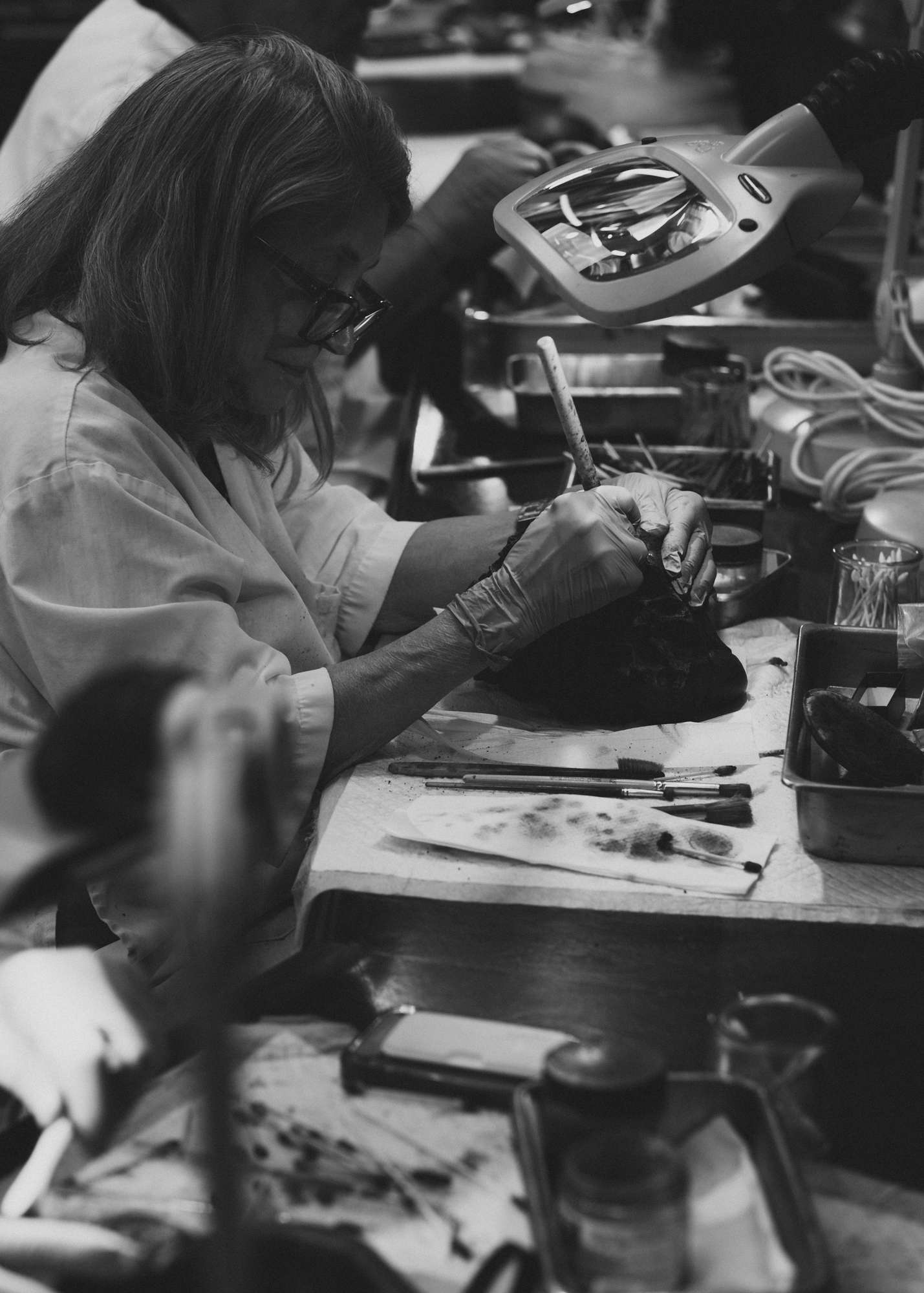 Person Cleaning Fossil at the La Brea Tar Pits