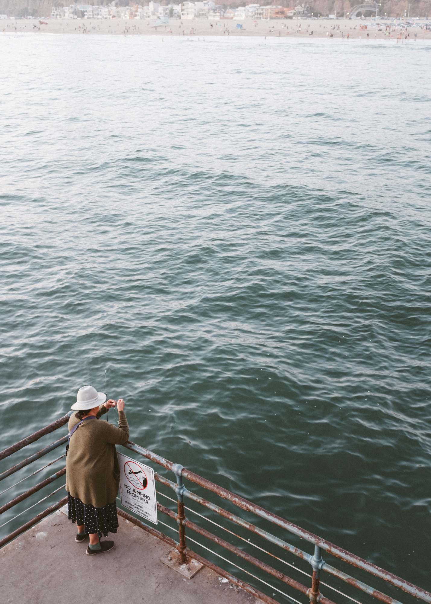 Fisherwoman Tying Her Line